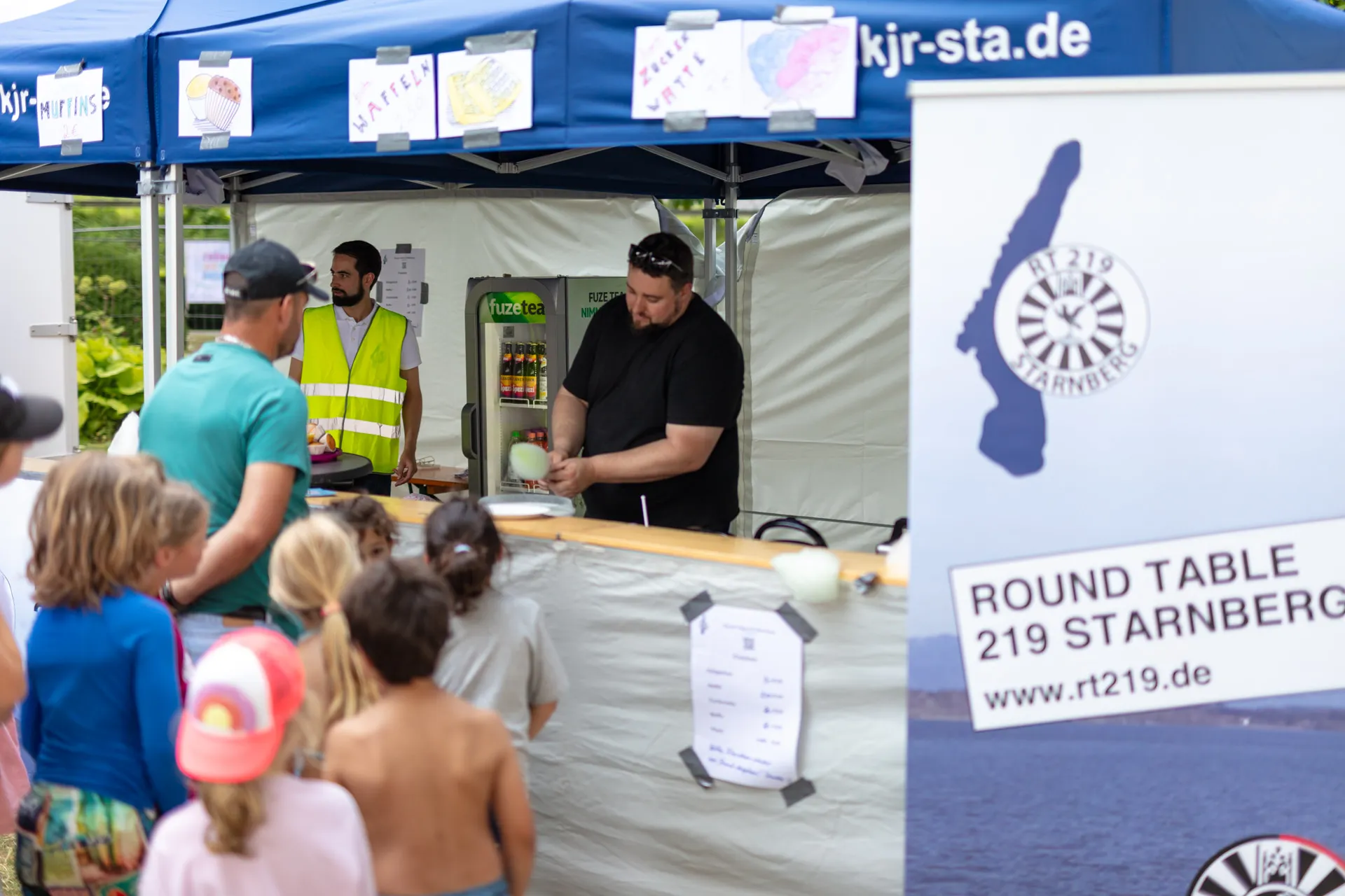 Round Table 219 stand at the paper boat race in Starnberg